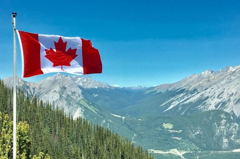 Medium red and yellow canada day saying   quote twitter post